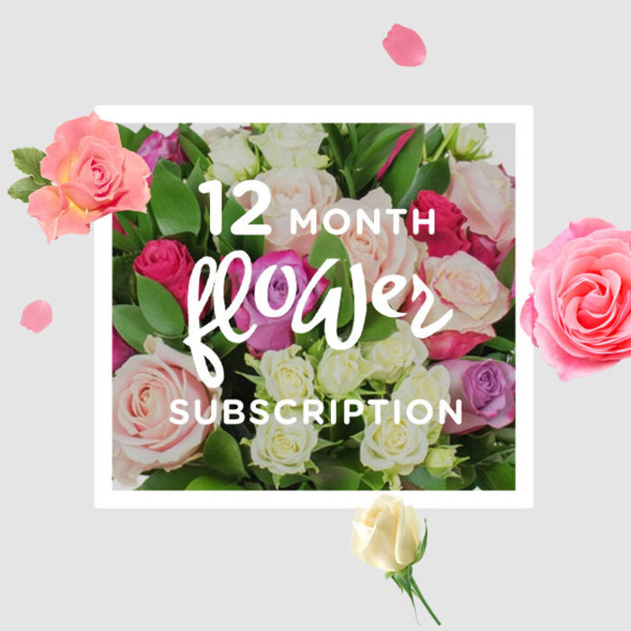 The photograph presents a lush, rose-filled bouquet that tells the story of a year-long flower subscription with quiet, confident elegance. The arrangement is densely packed, forming a soft dome of blooms in complimentary shades: pale blush, warm cream, cool lilac, and deeper tones of raspberry and magenta that draw the eye inward. Each rose appears carefully placed, their petals layered and spiralled in intricate patterns that speak to the care and precision of a professional florist. Between the blossoms, sprigs of fresh green foliage introduce contrast and breathing space, their glossy surfaces catching the light just enough to define the outline of the bouquet. The backdrop is light and unobtrusive, much like the walls of a calm, modern shop near Brent Cross Shopping Centre, where the hum of traffic from the North Circular feels distant. Floating petals and scattered mini blooms frame the central cluster, adding a whimsical sense of movement, as though each month's delivery might bring a slightly new configuration of colours and shapes. The lighting is soft and diffused, enhancing the velvety texture of the petals and the gentle shadows that give the bouquet depth, making it almost three-dimensional. You can imagine this arrangement arriving regularly at homes in Brent Cross, Golders Green, or along Finchley Road, each delivery filling its space with a delicate, slightly sweet fragrance and a sense of being thoughtfully remembered. The image conveys more than a single moment-it suggests a comforting rhythm of beauty, quietly accompanying the everyday life of the recipient throughout all twelve months.