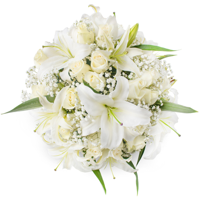 Framed from above against a seamless white field, this circular bouquet reads as a study in tonal whites and soft textures, expertly arranged to feel both full and refined. Prominent white oriental lilies open their broad trumpets toward the viewer, their light green stamens and occasional soft purple tint at the throat lending subtle depth to otherwise luminous petals. Interwoven with these lilies are clusters of creamy ivory roses, many kept in a tight bud state or just beginning to open, their velvety layers creating gentle shadows and a tactile sense of luxury. Sprigs of white Baby's Breath nestle into the gaps, their tiny blooms creating an airy, cloud-like underlayer that lightens the composition and gives it movement despite the compact, rounded form. A few lively green leaves peek around the perimeter, offering a fresh, natural frame to the sea of white. The overall impression is of timeless elegance and calm - a bouquet suited to weddings, anniversaries, or moments of remembrance - carrying the quiet fragrance of lilies and roses. As a local arrangement appropriate for Brent Cross occasions, it evokes nearby places such as Brent Cross Shopping Centre and the quieter residential streets toward Cricklewood, ready to be delivered with careful handling so the blooms arrive as pristine as when they left the studio.
