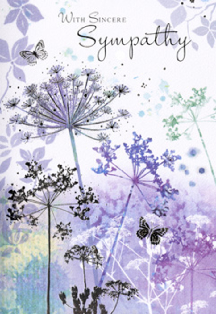 This sympathy card carries a serene, meditative character, like stepping briefly away from the bustle of Brent Cross Shopping Centre into a pocket of pure quiet. The artwork centres on tall wildflower forms, specifically umbelliferous stems that lift delicately upwards, each one crowned with a filigree head of tiny clustered blossoms. These blooms are painted in layered shades of violet, dusky indigo, and soft powder blue, set against a backdrop where muted purples slowly merge into veils of silvery green. The effect is that of a misty meadow at dawn, where light is diffused and edges are softened, allowing shapes and colours to blend harmoniously. The stems are spindly yet confident, arching with natural grace and forming an airy pattern that feels open and uncluttered. Between them, hints of distant foliage and faint grasses appear, barely suggested rather than fully defined, which adds depth without overwhelming the eye. Two or three butterflies hover near the tops of the wildflowers, their wings rendered in almost transparent washes of colour. They seem suspended mid-air, adding the suggestion of gentle movement and the comforting idea that life continues to flutter quietly, even amid sorrow. The overall palette is cool but kind, evoking stillness, thoughtfulness, and a gentle invitation to remember. As someone who arranges sympathy bouquets and funeral flowers for families in and around Brent Cross, this design feels like a visual echo of the words we struggle to speak in difficult times-an image that allows the recipient to pause, breathe, and feel held in quiet understanding without any need for grand gestures or bright, distracting tones.