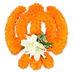 At the centre of this floral composition a sacred emblem is shaped from dense clusters of vivid orange marigolds, their rounded heads packed so closely the surface resembles a richly textured textile. The marigolds form the recognisable contours of a Sikh symbol - warm, luminous and tactile - while a small, concentrated cluster of snow-white lilies anchors the base, two or more stars of white whose unfurling petals and faintly green-tinged throats reveal delicate yellow stamens. These lilies introduce a cool, calming counterpoint: their satin petals and gentle scent soften the marigolds' exuberant colour and add a comforting clarity to the visual narrative. Around the central blossoms, fine sprays of baby's breath and glossy green foliage sweep subtly, offering airy pockets of breath and shadow that model the symbol's shapes and add depth without detracting from the main motif. The piece sits on a pure white field with a fine drop shadow beneath, suggesting a freestanding ceremonial plaque or table-top tribute; the light is soft and even, catching the marigolds' textured faces and the lilies' smooth curves. As a local florist familiar with Brent Cross and Cricklewood gatherings, I often prepare similar floral emblems for temple celebrations and community remembrances; this one was assembled with freshly harvested blooms and is suitable for local delivery or same-day collection around Brent Cross Shopping Centre. The design reads as an expression of reverence and celebration - bold in colour, tender in detail - meant to convey unity, spiritual honour and a sense of quiet dignity within a neighbourhood ritual or festival.