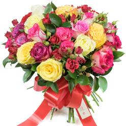 A vibrant, artfully assembled bouquet of mixed roses set against a stark white background, conveyed with the calm authority of a local Brent Cross florist who knows how a bouquet should feel and smell. The dome-shaped arrangement is densely packed with a joyful palette: bright yellow roses like captured sunlight; creamy ivory or pale yellow blooms; a range of pinks from barely-there blush to electric fuchsia and elegant bicoloured pink-and-white petals; and rich, velvety reds and burgundy that anchor the composition. Interspersed are smaller spray roses and tight buds, creating a tactile rhythm between open, ruffled heads and smooth, unopened shapes. Dark glossy foliage - the sort of ruscus or salal we source from trusted growers - slips through the flowers, giving each colour contrast and a cool, leafy backdrop. At the stem base a wide, festive red satin ribbon is tied into a sweeping bow with long tails, and a white tag reading "Happy Holidays" is tucked into the knot, suggesting a seasonal or celebratory use. The scent is described as fresh, slightly citrus-lifted and clean, inviting without overwhelming. As a Brent Cross Flowers creation, this bouquet is portrayed for local delivery across Brent Cross, Hendon and nearby Cricklewood neighborhoods, imagined resting on a mantle or dining table as a heartfelt gift for anniversaries, valentines, or to celebrate a special milestone with warm, floral abundance.
