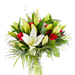 A radiant studio portrait of a tall, elegant bouquet centred on a single, fully open creamy white oriental lily whose smooth, sculptural petals unfurl to reveal pale yellow stamens and a soft green pistil. Around that luminous focal bloom a constellation of lime-green and pale-yellow lily buds - some tightly closed, others just beginning to awaken - suggests quiet movement and promise. Scattered through the mass of buds are velvety red rosebuds and small roses, their petals still mostly curled, offering dramatic punctuations of passionate crimson against the softer tones. The arrangement is cushioned and framed by a rich variety of greens: broad, dark forest-green lily leaves give weight and structure; lighter emerald palm-like fronds arc and cascade, introducing a sense of sweep and motion; and rounded, silvery-green eucalyptus stems lend a breath of cool contrast and delicate texture. All stems are gathered in a simple cylindrical clear glass vase so the pale green stalks are visible beneath fresh water, the transparency emphasising the bouquet's cleanliness and vitality. Photographed on a bright white background, the composition reads as pure and celebratory - cool whites and warm reds balanced by layered greens and varied textures. Imagine the scent: the powdery sweetness of lilies meeting the warm, heady note of roses. As a local Brent Cross tribute, this bouquet would sit perfectly on a shelf near the shopping centre or brighten a mantel in a home close to Fryent Country Park, sending a message of love, fresh beginnings, and considered craft from a neighbourhood florist attentive to colour, scent and form.