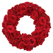 From Brent Cross Flowers, this lush circular wreath is crafted entirely from dozens of deep crimson roses and set against a pristine white backdrop. The ring is densely packed, with each bloom pressed snugly against its neighbour to create a plush, velvety surface that invites a gentle touch. Large, fully opened heads reveal velvety petals that unfurl in soft spirals, while smaller buds, some just beginning to blossom, are tucked between them to add subtle texture and depth. No greenery or filler interrupts the line; the roses themselves form a seamless circle, their ruby-red hues consistent from edge to center. The petals catch the light in soft, jewel-like glints, highlighting the careful craftsmanship that goes into choosing and placing every bloom. Symbolically, the wreath embodies love, admiration, beauty, and remembrance, making it suitable for romantic declarations, memorial tributes, or refined decor for celebrations and ceremonies. The stark white background isolates the arrangement, ensuring the intensity of red remains the focus and the craftsmanship proud and evident. In Brent Cross and nearby Cricklewood and Golders Green, this classic design is a trusted choice for heartfelt expressions, offered with Brent Cross Flowers' reliable same-day delivery to local homes and venues. It's a piece that speaks of quiet dignity and enduring affection, a wreath that can accompany a doorway, a service, or a ceremonial welcome with grace and timeless elegance. Its presence on a doorstep signals care and ceremony, inviting guests to pause, inhale the rose scent, and feel the moment begin. The wreath stands as a shared memory and a hopeful greeting across Brent Cross.