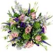 Seen from directly above, this bouquet forms a lush, almost perfectly circular island of floral colour set on a clean white background, where every petal and leaf is given room to shine. The main blooms are generously open roses in soft blush and dusty mauve, their petals unfolding in smooth, layered spirals that convey a sense of intimacy and timeless beauty, the kind of flowers you might place in a sunlit Brent Cross kitchen to lift the mood of the day. Scattered between them are delicate, daisy-like asters in shades of pale lavender, each with a golden-yellow centre that adds a pinpoint of light and a gentle, playful charm. Darker, more dramatic accents come from lisianthus blossoms in deep purple and indigo, their ruffled, bell-shaped petals curling slightly at the edges to create shadows and a velvety depth within the design. Rising through the arrangement are slender stems of Veronica or Speedwell, their narrow spikes covered in tiny purple florets that introduce a sense of vertical energy and movement, as though the bouquet were gently swaying in a soft breeze near Brent Cross's green spaces. Punctuating the flowers are bright green, spherical tufts resembling Green Trick dianthus, whose fine, moss-like texture invites the fingertips and provides a lively contrast to the smoother petals around them. Silvery eucalyptus leaves curve and weave throughout, their cool, muted colour tempering the richer hues and suggesting a refreshing, subtly herbal fragrance that balances the sweetness of the roses. Additional foliage and buds fill every gap, making the bouquet look full and complete from edge to edge. The overall feeling is one of calm celebration and quiet joy, ideal for birthdays, new baby gifts, or a same-day delivery to brighten a Brent Cross office or apartment.