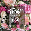 Brent Cross Flowers presents a vibrant, overhead close-up of the Florist Choice Basket, a luxurious gift that brims with an abundant mix of fresh blooms and lush foliage. The arrangement rests in a rustic yet elegant white woven basket, its handle softly greeted by the blooms and a whisper of natural texture. The palette is a warm symphony of soft pinks, creamy whites, deep fuchsias, and fresh greens, evoking celebration and romance in equal measure. Dominant features include large, ruffled hot pink peonies that catch the eye with their velvet petals, white ranunculus with tightly wound layers, fluffy clusters of pale pink hydrangeas, and blush- and cream-toned roses. Interspersed among these statement blooms are delicate white filler blossoms and wisps of eucalyptus, adding air, movement, and a hint of woodland freshness. A sense of depth comes from the way stems are arranged to cradle each flower, creating a lush, inviting bouquet that almost invites fingertips to skim its surface. Centered over the heart of the display is a clean white square overlay bearing the words Florist Choice Basket in an elegant script, with the price quietly set beneath in a bold sans-serif. The overlay feels modern against the traditional florals, a visual cue that craftsmanship is paired with contemporary gifting. The lighting catches dewdrop-like moisture on petals and the soft sheen of the basket weave, while the fragrance implied by the arrangement hints at honeyed peonies and fresh-cut greenery. This photograph tells the story of a premium floral gift-carefully selected, artfully arranged, and ready for Brent Cross delivery or collection. Designed to mark anniversaries, birthdays, or heartfelt congratulations, the Florist Choice Basket promises a moment of beauty and emotion. It is photographed with the confidence of a local studio near Brent Cross Shopping Centre, suggesting dependable, same-day delivery across Brent Cross, Cricklewood, and surrounding neighborhoods through Brent Cross Flowers, your trusted local florist.