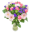 There's pure poetry in this arrangement, crafted by someone who knows the gentle moods of Brent Cross. Soft, pale pink roses unfurl gracefully among round gerbera daisies, their pastel glow enhanced by shafts of soft daylight, against a foundation of deep, lush greenery. Between these familiar blooms, lively spikes of purple statice introduce a vibrant, almost playful contrast, akin to the colours cast across local parks at sunset. The slender glass vase is simplicity itself, allowing the natural shapes and fresh stems to shine. Designed for birthdays, congratulations, or quiet, supportive gestures, the bouquet has an airy fullness, as if gathered in an early-morning stroll through local gardens. Each stem and bloom is selected with Brent Cross's spirit in mind, so when delivered, the arrangement speaks of both beauty and the heartfelt care of a neighbourhood florist.